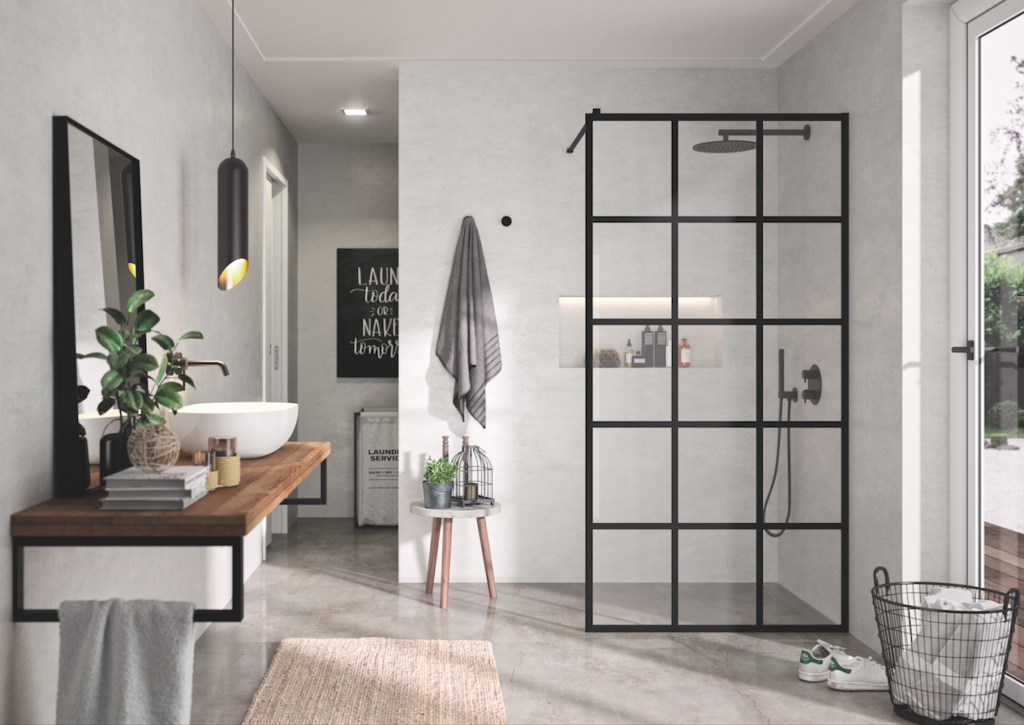 Mampara fija de ducha con perfilería y decorado en negro