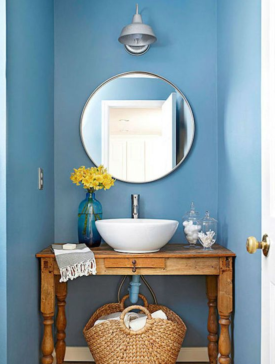 Espejos de lavabo redondos, biselados y pequeños que son tendencia en el  cuarto de baño